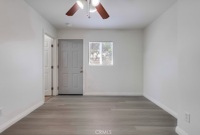 18417 Santar St, Rowland Heights, CA 91748 - spare room with a ceiling fan, baseboards, and wood finished floors