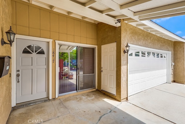 18417 Santar St, Rowland Heights, CA 91748 - property entrance with stucco siding and a garage