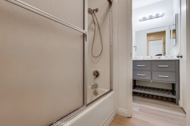 18417 Santar St, Rowland Heights, CA 91748 - bathroom featuring wood finished floors, shower / tub combination, and vanity