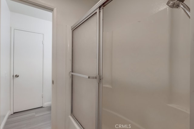 18417 Santar St, Rowland Heights, CA 91748 - bathroom with wood finished floors and baseboards