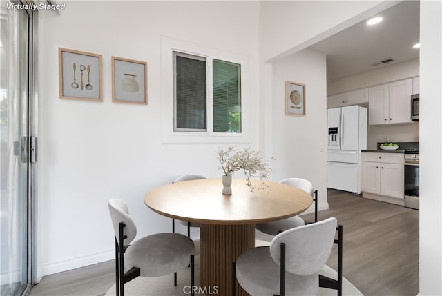 18417 Santar St, Rowland Heights, CA 91748 - dining room with light wood-style floors, baseboards, and recessed lighting