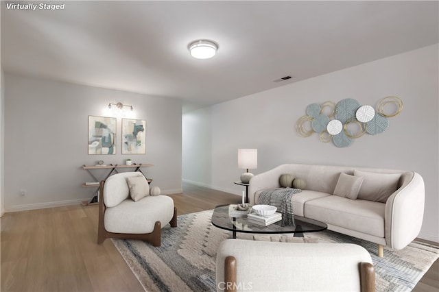 18417 Santar St, Rowland Heights, CA 91748 - living room featuring light wood finished floors and baseboards