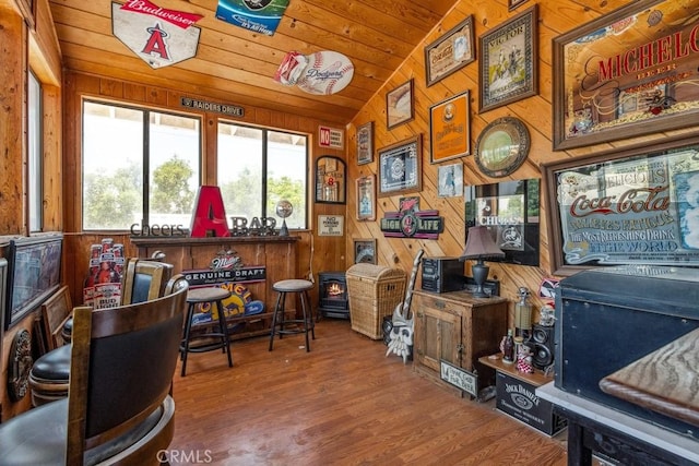 33206 Churchill St, Lake Elsinore, CA 92530 - office area featuring vaulted ceiling, wood walls, wooden ceiling, wood finished floors, and a wood stove