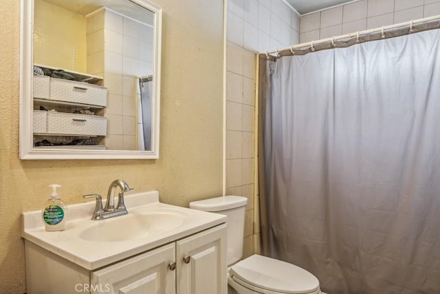 33206 Churchill St, Lake Elsinore, CA 92530 - full bathroom with vanity, a shower with shower curtain, and a textured wall