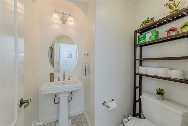 1330 W Marigold Ave, La Habra, CA 90631 - bathroom featuring toilet, tile patterned flooring, and baseboards