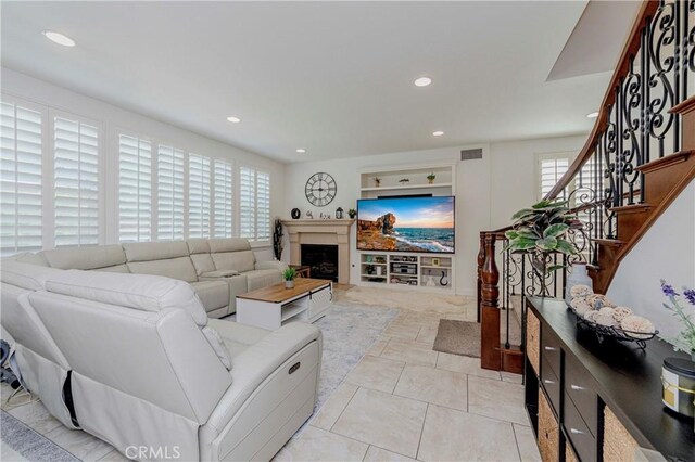 1330 W Marigold Ave, La Habra, CA 90631 - living area with recessed lighting, stairway, and a fireplace