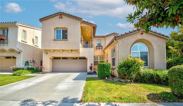1330 W Marigold Ave, La Habra, CA 90631 - mediterranean / spanish home with stucco siding, a balcony, a garage, driveway, and a tile roof