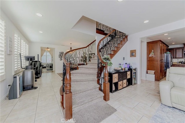 1330 W Marigold Ave, La Habra, CA 90631 - stairs featuring recessed lighting, tile patterned flooring, and baseboards