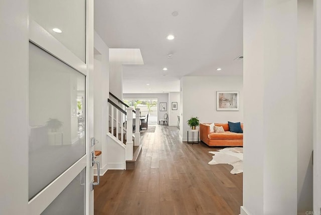 939 Moonstone Ct, Encinitas, CA 92024 - foyer featuring stairs, wood finished floors, recessed lighting, and baseboards