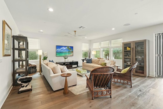 939 Moonstone Ct, Encinitas, CA 92024 - living area featuring wood finished floors, a ceiling fan, recessed lighting, and baseboards
