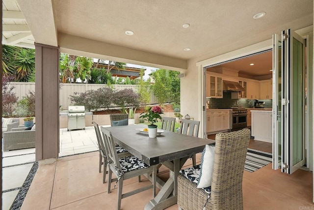 939 Moonstone Ct, Encinitas, CA 92024 - view of patio / terrace featuring outdoor dining space and a grill