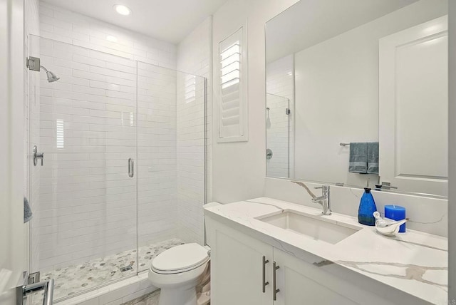 939 Moonstone Ct, Encinitas, CA 92024 - full bathroom with vanity, a stall shower, toilet, and recessed lighting