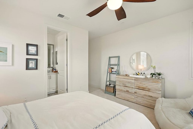 939 Moonstone Ct, Encinitas, CA 92024 - bedroom featuring ensuite bathroom, ceiling fan, and light colored carpet