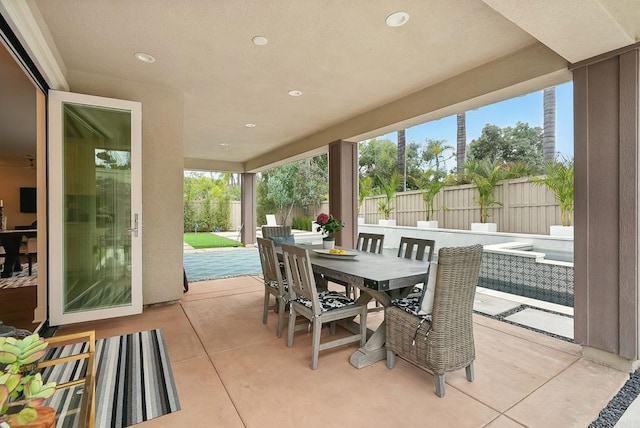 939 Moonstone Ct, Encinitas, CA 92024 - fenced backyard featuring outdoor dining space and a patio area