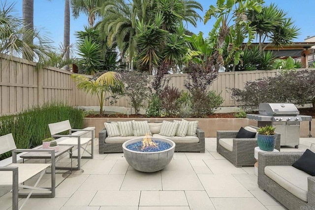 939 Moonstone Ct, Encinitas, CA 92024 - fenced backyard with an outdoor living space with a fire pit, a patio area, and area for grilling