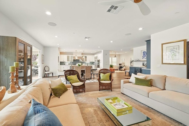 939 Moonstone Ct, Encinitas, CA 92024 - living room featuring recessed lighting, ceiling fan, and light wood-type flooring