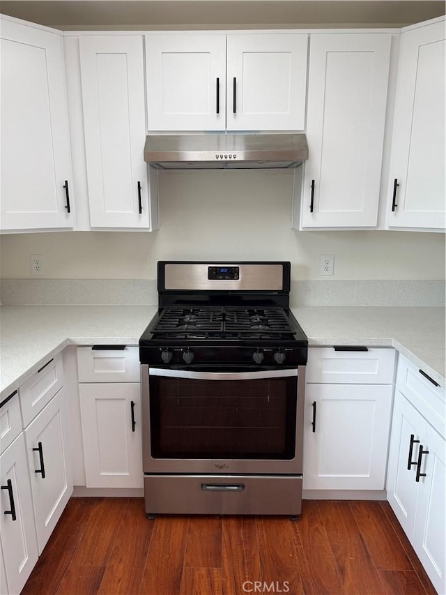 8537 Edgebrook Dr, Garden Grove, CA 92844 - kitchen featuring stainless steel range with gas cooktop, exhaust hood, dark wood-style floors, and white cabinets