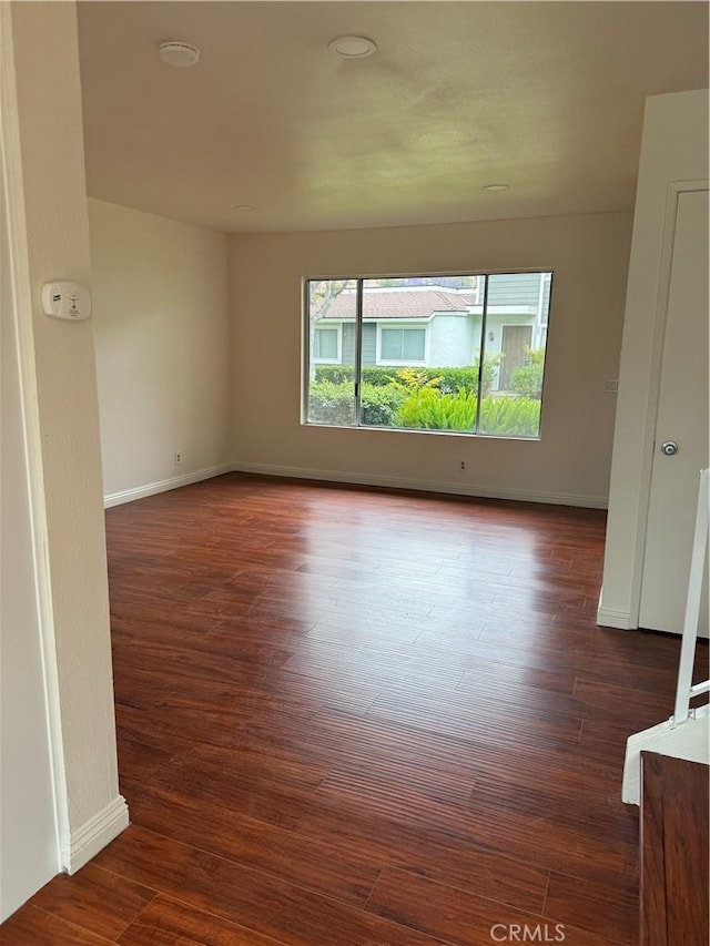 8537 Edgebrook Dr, Garden Grove, CA 92844 - unfurnished room featuring dark wood-style flooring and baseboards
