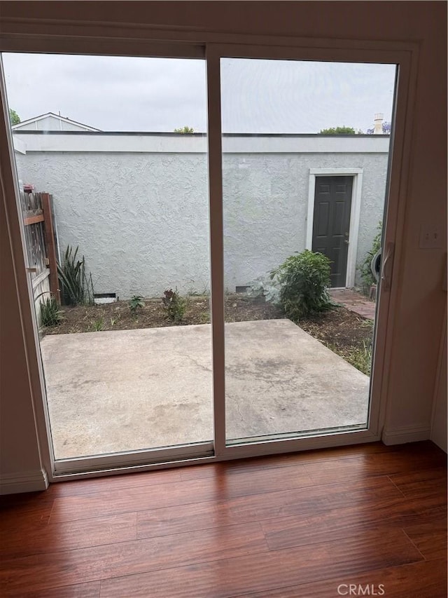 8537 Edgebrook Dr, Garden Grove, CA 92844 - doorway with dark wood-style flooring and baseboards