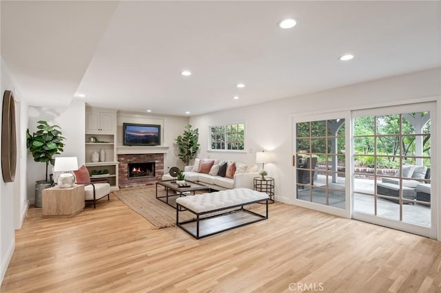 4947 Blackhorse Rd, Rancho Palos Verdes, CA 90275 - living area featuring baseboards, light wood-type flooring, a fireplace, and recessed lighting