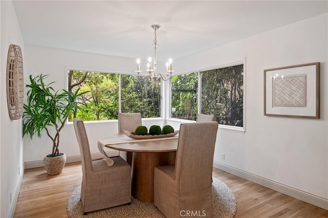 4947 Blackhorse Rd, Rancho Palos Verdes, CA 90275 - dining room featuring healthy amount of natural light, a chandelier, and light wood-style flooring