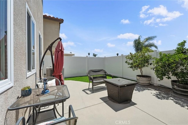 293 Belize Way, Oceanside, CA 92057 - fenced backyard featuring a patio, outdoor dining area, and central air condition unit