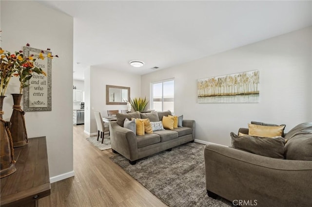 293 Belize Way, Oceanside, CA 92057 - living area with wood finished floors and baseboards