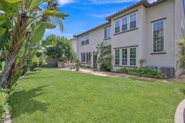 10 Edendale St, Ladera Ranch, CA 92694 - view of green lawn with a patio and cooling unit