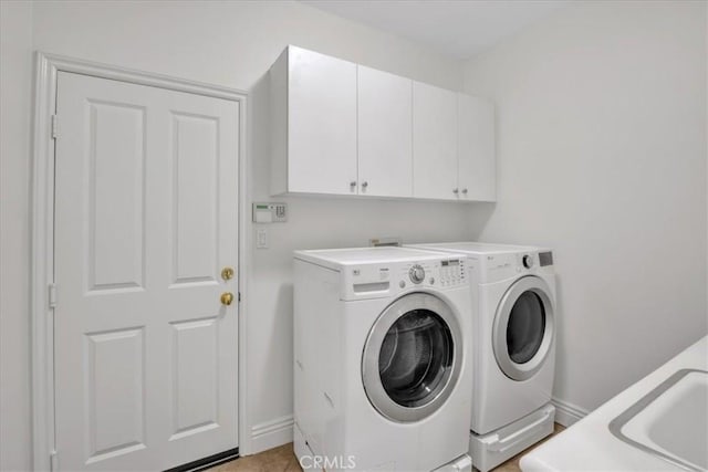10 Edendale St, Ladera Ranch, CA 92694 - washroom featuring cabinet space, separate washer and dryer, and baseboards