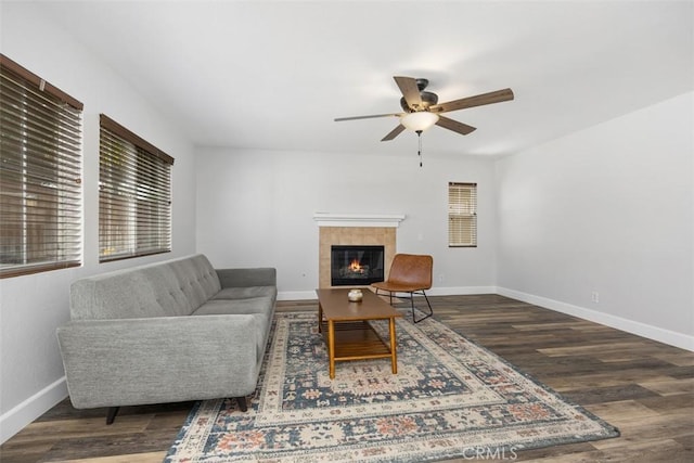 42192 Delmonte St, Temecula, CA 92591 - living area featuring a ceiling fan, wood finished floors, baseboards, and a tiled fireplace