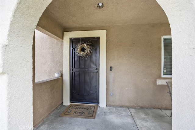 42192 Delmonte St, Temecula, CA 92591 - doorway to property with stucco siding