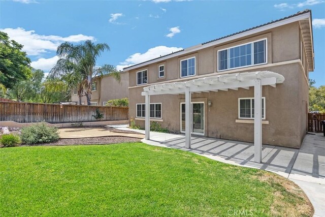 42192 Delmonte St, Temecula, CA 92591 - rear view of house with stucco siding, a pergola, and a patio