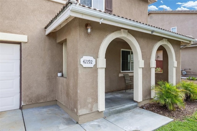 42192 Delmonte St, Temecula, CA 92591 - entrance to property featuring stucco siding