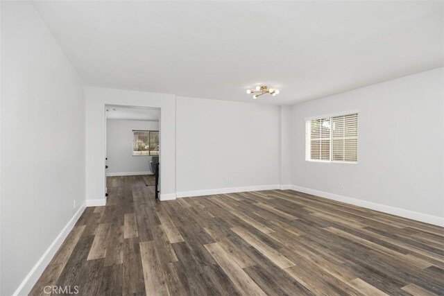 42192 Delmonte St, Temecula, CA 92591 - unfurnished room featuring dark wood-style floors and baseboards