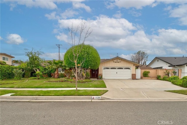 1528 E San Alto Ave, Orange, CA 92865 - view of front of home featuring driveway, an attached garage, and brick siding