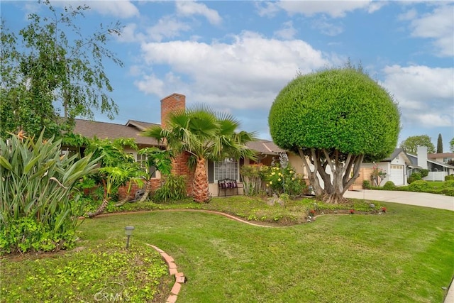 1528 E San Alto Ave, Orange, CA 92865 - view of front facade with a front lawn, a chimney, and concrete driveway