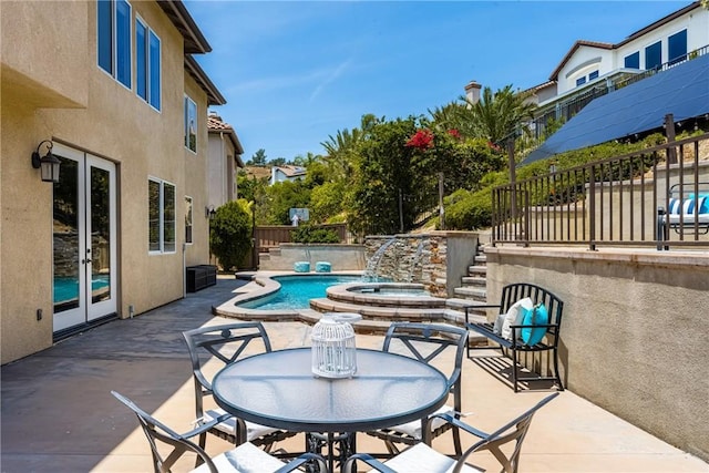 2437 N Eaton Ct, Orange, CA 92867 - view of patio with french doors and an outdoor hot tub