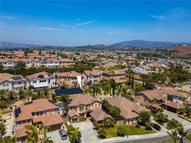 2437 N Eaton Ct, Orange, CA 92867 - aerial perspective of suburban area featuring a mountainous background
