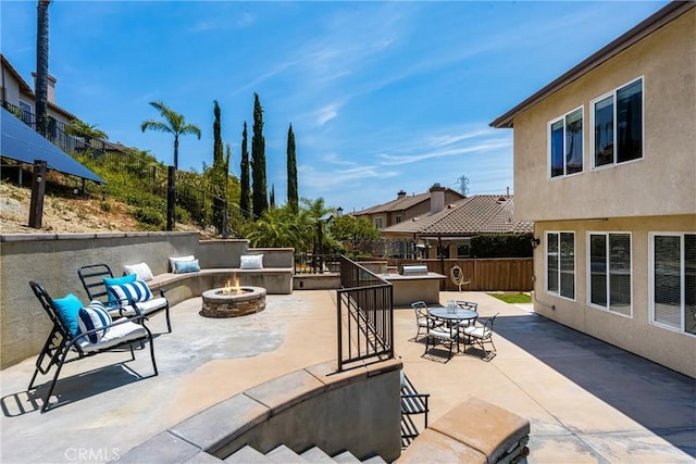 2437 N Eaton Ct, Orange, CA 92867 - view of patio / terrace featuring an outdoor fire pit and outdoor dining area
