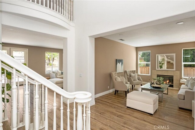 2437 N Eaton Ct, Orange, CA 92867 - living room featuring wood finished floors and a fireplace