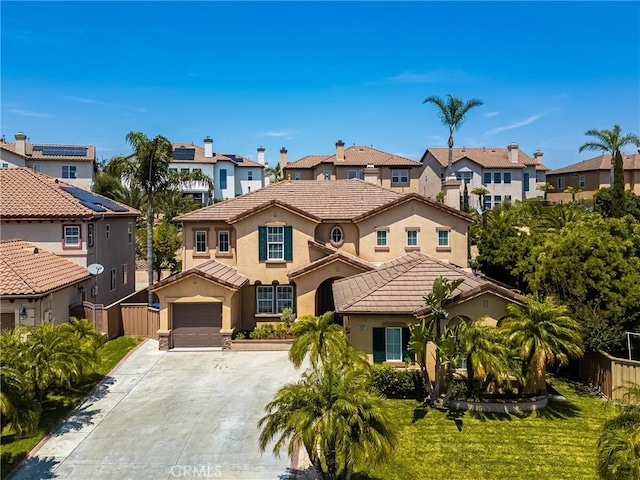 2437 N Eaton Ct, Orange, CA 92867 - view of front facade with a residential view, concrete driveway, stucco siding, and a tiled roof