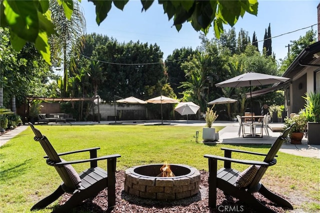 17949 Archwood St, Reseda, CA 91335 - view of green lawn featuring an outdoor fire pit and a patio