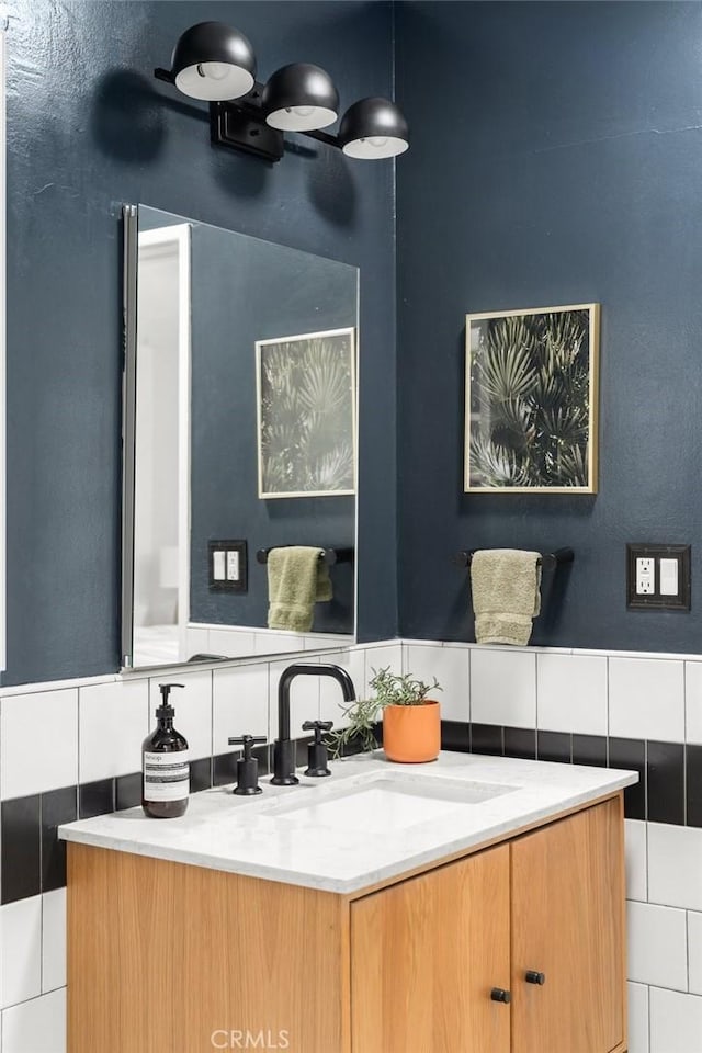 17949 Archwood St, Reseda, CA 91335 - bathroom with vanity, tile walls, and tasteful backsplash