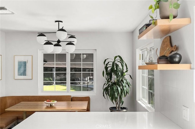 17949 Archwood St, Reseda, CA 91335 - dining space with breakfast area, healthy amount of natural light, and a chandelier