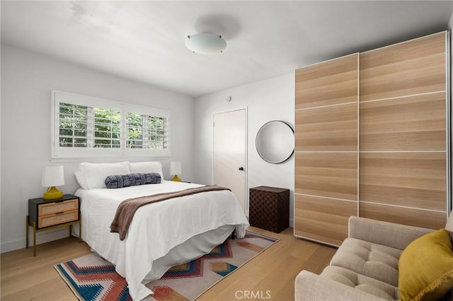 17949 Archwood St, Reseda, CA 91335 - bedroom with light wood-style flooring