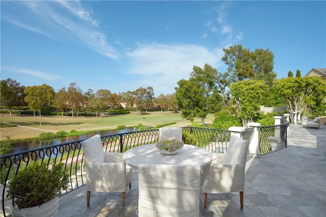 2 Royal Saint George Rd, Newport Beach, CA 92660 - view of patio featuring golf course view, a water view, and view of scattered trees