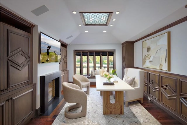 2 Royal Saint George Rd, Newport Beach, CA 92660 - dining room with a fireplace, dark wood-type flooring, lofted ceiling, recessed lighting, and a skylight
