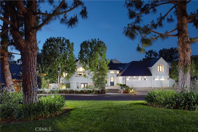 2 Royal Saint George Rd, Newport Beach, CA 92660 - view of front facade with a lawn and driveway