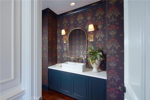 2 Royal Saint George Rd, Newport Beach, CA 92660 - bathroom featuring vanity, wood finished floors, and wallpapered walls