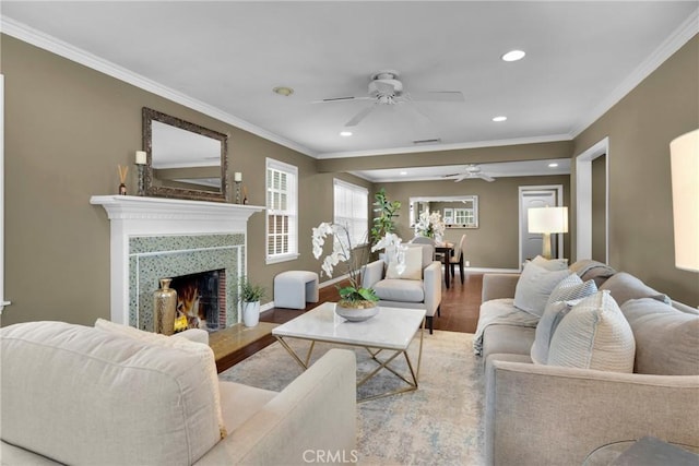 825 E Palm Ave, Monrovia, CA 91016 - living area with wood finished floors, a ceiling fan, recessed lighting, ornamental molding, and baseboards